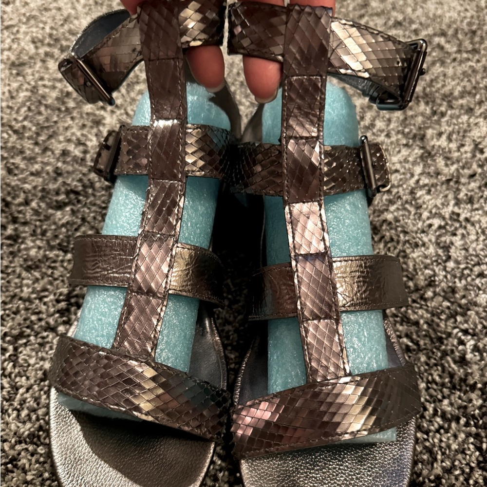 Kenneth Cole gladiator sandals.